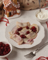 Prepared semi-finished products. Dumplings, khinkali, manti. New year's atmosphere
