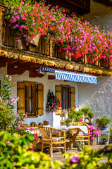 typical bavarian frontyard at a farmhouse near the alps