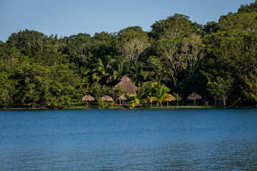 Private hut on the coast of a blue lagoon in Bacalar, Mexico. 