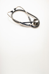 Usual classic medical stethoscope with one-way head on white