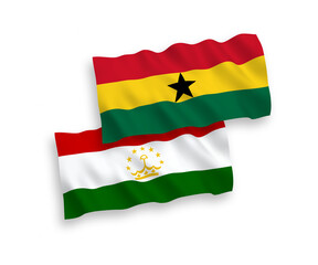 National vector fabric wave flags of Tajikistan and Ghana isolated on white background. 1 to 2 proportion.