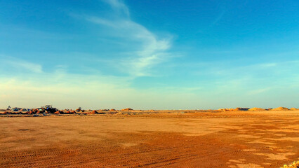 Fototapeta na wymiar Construction machinery in the Arabian desert 