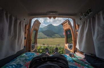 Waking up in front of the Tatras after sleeping in a camper van