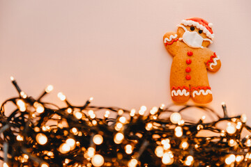 Special New Year's background with elements of the Christmas cookies, festive lights, Christmas ornaments: covid 19 concept