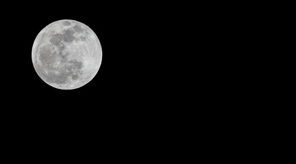 Full moon or super moon stack dark night sky.