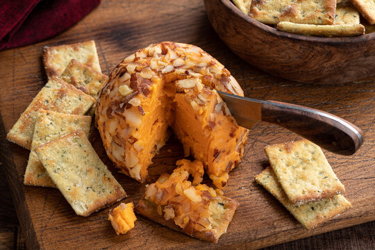 Cheese Ball Bonanza Powdery orange salty snack goodness. Yummy snack. Junk  food. Treat. Delicious background. Throwback food. Stock Photo