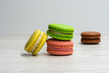 Four multi-colored macaroons