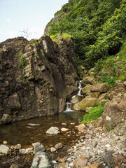 Mountain small waterfall, spring water