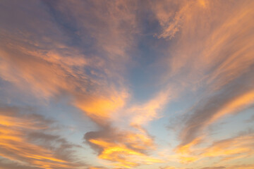 Dramatic sunset with Red,Orange,Yellow Clouds and Background Pastel Blue Sky.