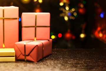 Gift boxes on new year's background with bokeh.