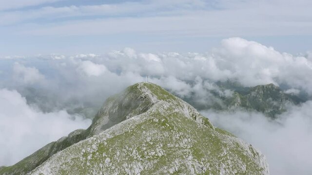 Pania della Croce ridge rises above Apuan Alps mountains in Tuscany Italy
