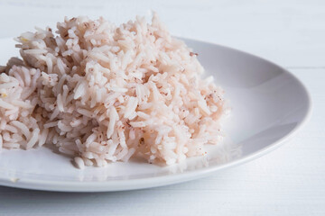 Brown rice and steamed rice on a plate