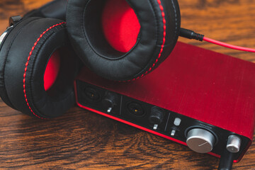 Headphones and sound card. Home recording studio.