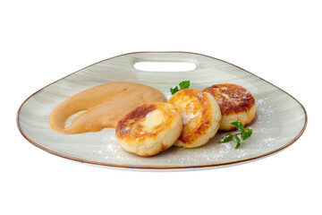 Cottage cheese pancakes on plate isolated on white