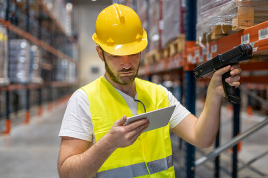 Worker scanning package in Warehouse