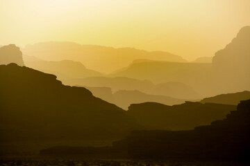 sunset in Wadi Rum, Jordan desert after a day hiking we enjoyed this view over the desolate mountains