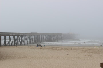Californian pier covered in clouds