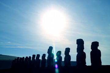 Bright Sun Raising over the Silhouette Gigantic Moai Statues of Ahu Tongariki Celemonial Platform, UNESCO World Heritage on Easter Island, Chile