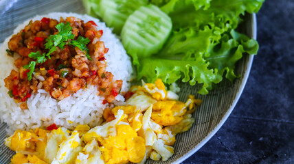 Basil Fried Rice with Fried Egg and Pork Thailand Food.