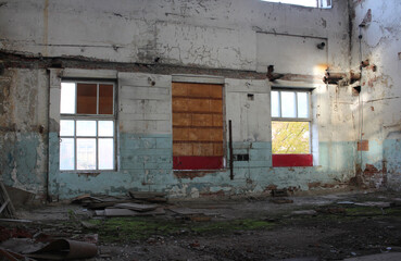 Fototapeta na wymiar abandoned destroyed building room inside with broken Windows