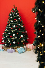 Christmas tree interior with gifts new year decor December