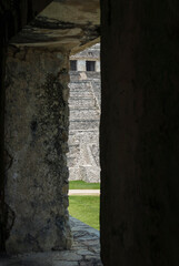 Gate with view to Temple of the inscriptions at the archaeological Mayan site in Palenque, Chiapas, Mexico