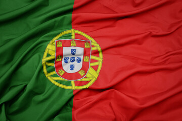 Fototapeta premium waving colorful national flag of portugal.