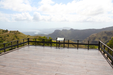 tourist viewpoint towards mountains and the ocean