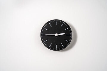 close up of an office clock on white background with clipping path