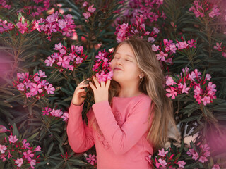 little girl holding a flower. High quality photo