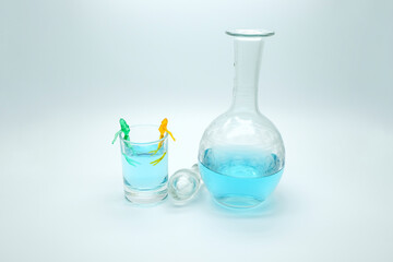 blue alcoholic drink in a decanter. Cocktail with blue gin , tonic