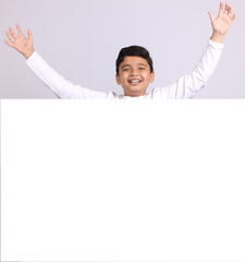 Young Indian schoolboy showing blank copy space.