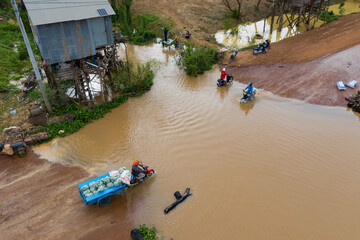 Flooded villages in western Cambodia . Flood on the Kampong Chhnang. View from flying drone of Kampong Chhnang village after few days of huge rain.