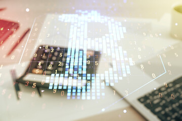 Double exposure of creative Bitcoin symbol hologram on calculator and pc background. Mining and blockchain concept