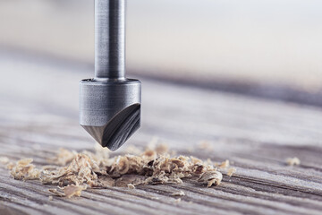 Countersink drill bit make sink in hole for screw in wooden plank