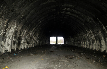 Fototapeta na wymiar Abandoned shelters for Soviet missiles