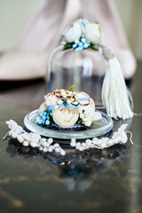A wedding rings with flowers, ears and heels