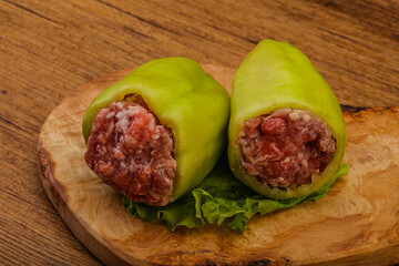 Raw stuffed bell pepper with meat