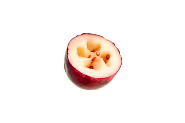 Cranberry half with seeds isolated on white