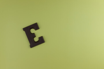 The letter of the alphabet E is made from chocolate