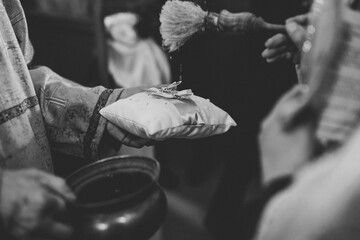 Wedding rings on ceremony at church. Macro.
