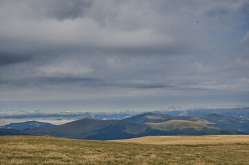 Fototapeta premium clouds over the mountain
