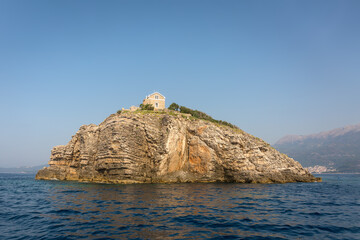 Fototapeta na wymiar Lighthouse on the small island