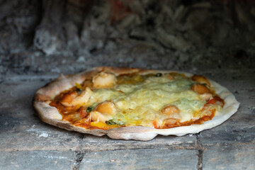 Homemade classic italian pizza. Chef makes homemade pizza on the holidays.