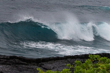 waves crashing on rocks