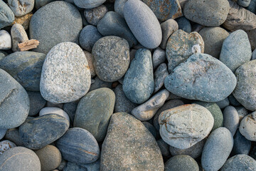 Fototapeta na wymiar large sea stones by the sea