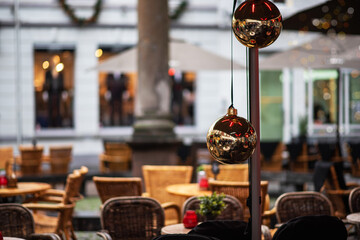 Christmas holidays composition with gold glitter lights background. Christmas decorations on the blurred background.