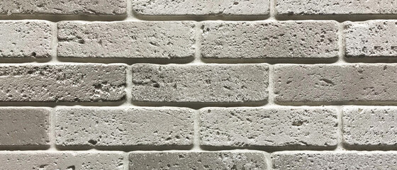 Grey brick wall texture background. Interior design concept with copy space