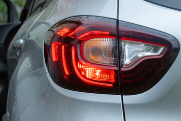 Led car rear light with 3D effect. Car rear light close-up