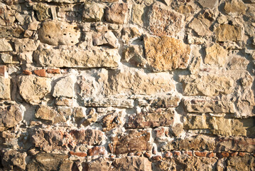 he stone background.wall of old ancient stones and bricks